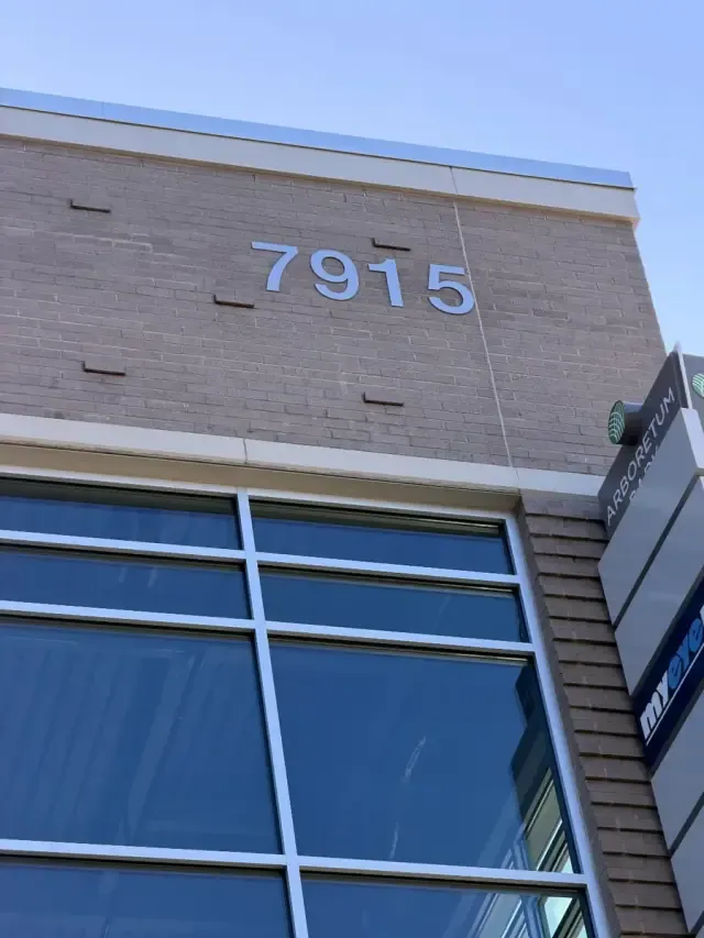 The building number 7915 on the exterior of the Nurvana Multistudio location.